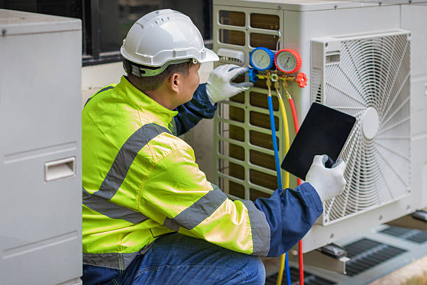 Professional Hvac technician working in Pinson, AL